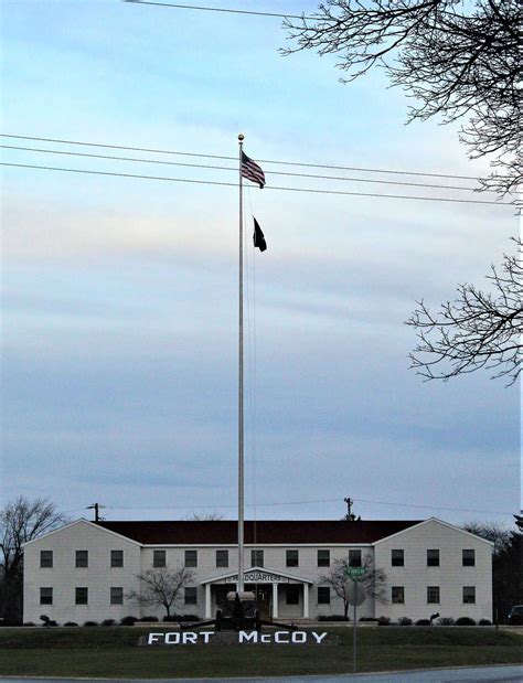 The U.S. flag is shown in front of garrison headquarters - NARA & DVIDS ...