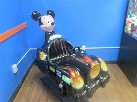 Mickey's Mischievous Ride | Mickey Mouse rides in the back o… | Flickr