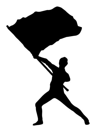 Silhouette of a Color Guard performer with a flag raised overhead ...