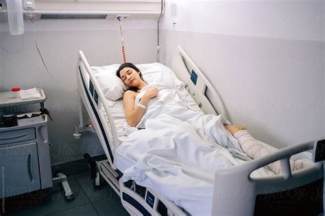 "Female Patient Sleeping In A Hospital." by Stocksy Contributor "Luis ...