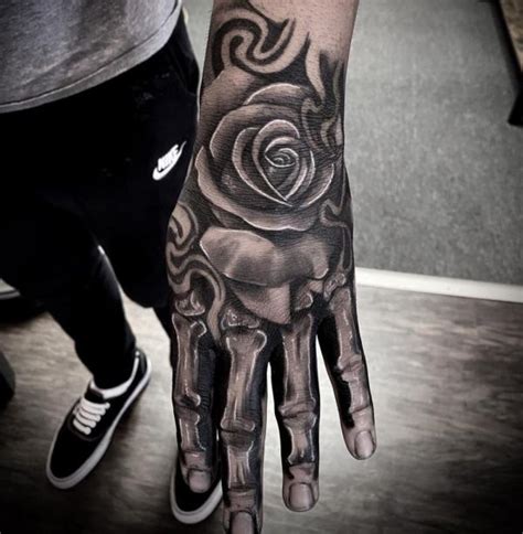 Top 74+ rose hand tattoo with skeleton fingers best - in.coedo.com.vn