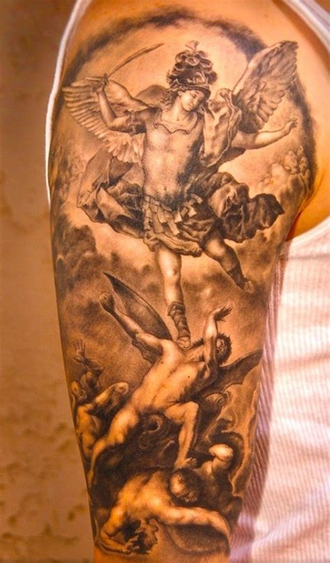 Angel and demons in fight tattoo on the shoulder - Tattooimages.biz