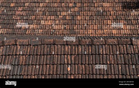 Tiled roof close-up texture, brick Stock Photo - Alamy