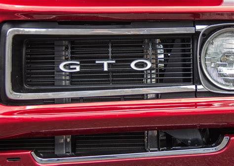 1968 Gto Grille Emblem Photograph by Robert Kinser