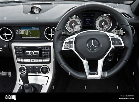 Dashboard and steering wheel in the Mercedes SLK 200 convertible ...