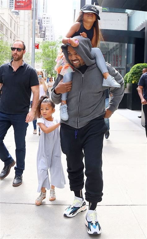 Kanye West is seen leaving his hotel with his daughter North West, who ...