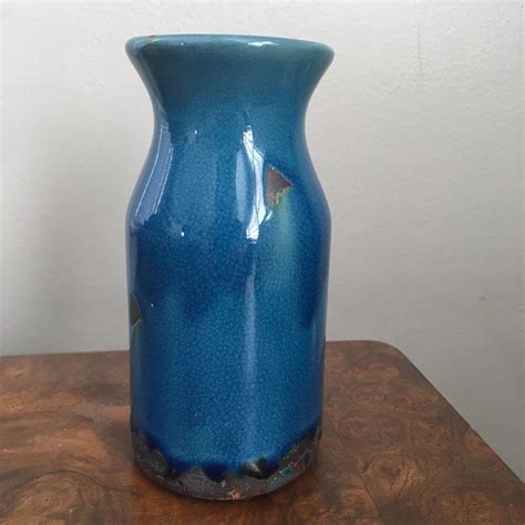 Blue ceramic vase. 6” high 2.75” in diameter... - Depop