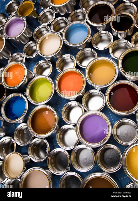 Metal cans with color paint Stock Photo - Alamy