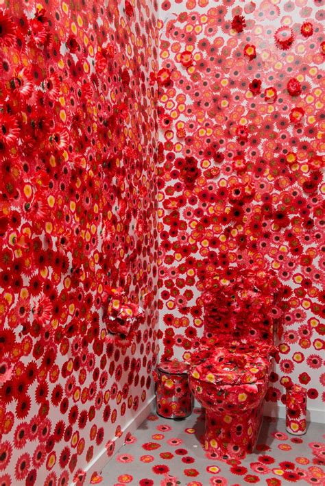 Yayoi Kusama Flower Obsession Looks Like an Explosion of Red Flowers