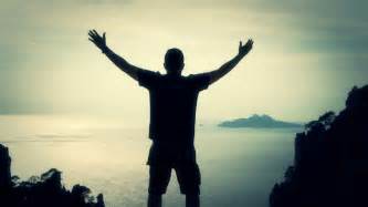 Success Pose Businessman Standing On Top Of A Mountain Raising Hands ...