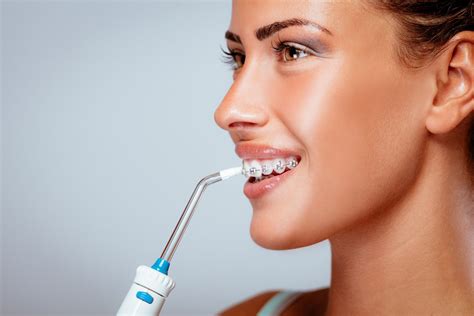 What Is a Water Flosser And How Does It Work | Carrollton Orthodontics