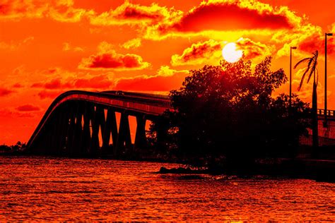 Sunset Over the Sanibel Causeway Bridge Photograph by Craig Gotschall ...