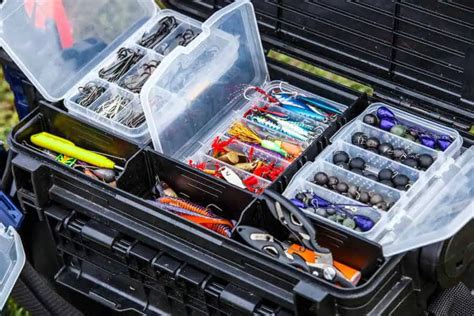 A large fisherman’s tackle box fully stocked with lures and gear for ...