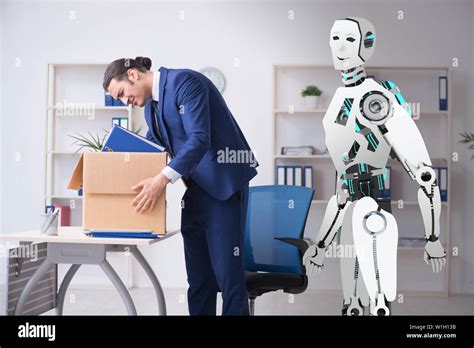 Concept of robots replacing humans in offices Stock Photo - Alamy