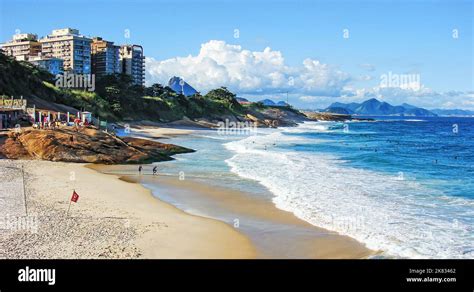 A view of the Copacabana beach in Rio de Janeiro, Brazil with surfers ...