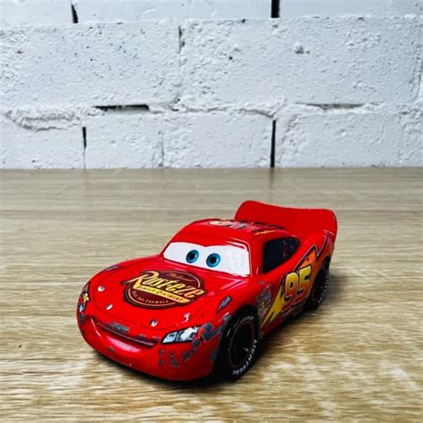 DISNEY PIXAR CARS Die-Cast Lightning Mcqueen with Racing Wheels World ...