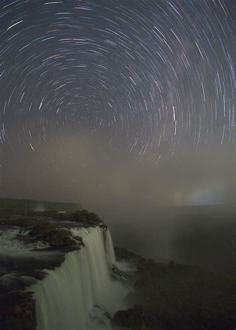 Lights on Sky over Waterfalls at Night · Free Stock Photo