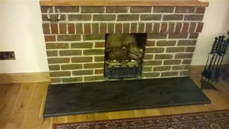 brick-fireplace-with-black-slate-hearth-natural-stone-tiles-hearths-in ...