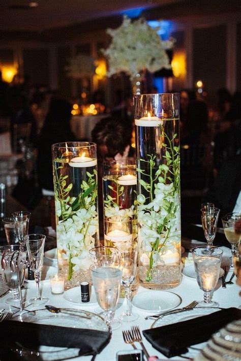 20 Floating Wedding Centerpiece Ideas | Roses & Rings | Wedding table ...