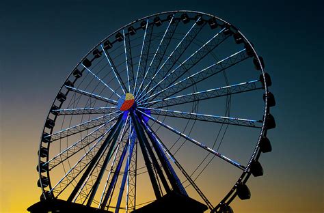 Ferris Wheel at sunrise-Pigeon Forge Tn Photograph by William Reagan