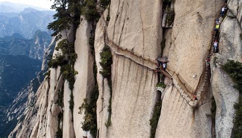 Huashan Mountain's Chang Kong Plank Road attracts explorers in NW China ...