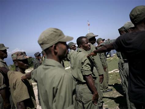 A polarizing force, Haiti's former soldiers return to streets | GMA ...