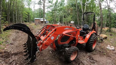 Clearing the new goat pen with Everything Attachments Wicked55 Grapple ...