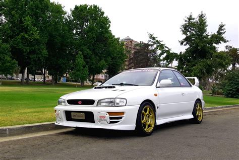 My fiancé's Subaru Impreza GC8. It took a lot of work to get it where ...