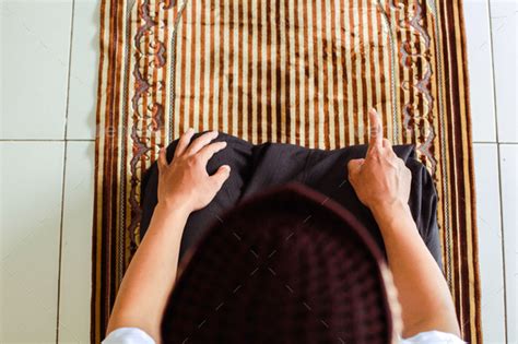 Muslim man hand salat in tahiyat posing Stock Photo by Garakta-Studio