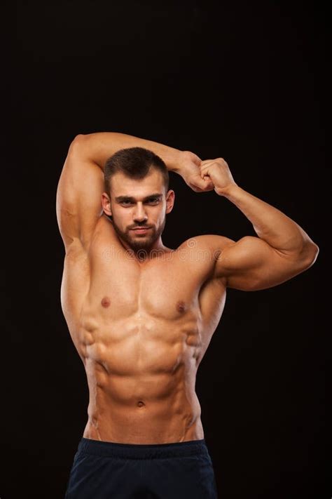 Strong Athletic Man - Fitness Model is Showing His Torso with Six Pack ...