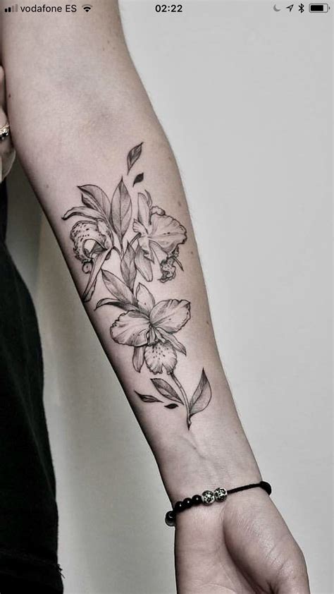 Flowering Orchid Flower Tattoo Forearm | Orchid flower tattoos, Orchid ...