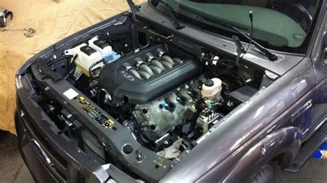 This is what a Coyote 5.0L V8 looks like in a 2011 Ford Ranger - Autoblog