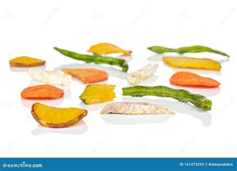 Dried Vegetable Chips Isolated on White Stock Photo - Image of green ...