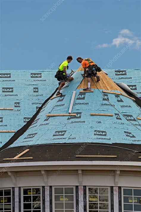 Synthetic roofing installation - Stock Image - C036/8886 - Science ...