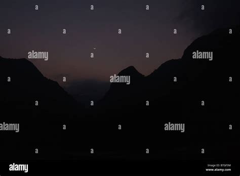 Sunset mountain scene Stock Photo - Alamy