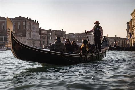 Venice: Gondola Ride & Guided Tour of St. Mark's Basilica | GetYourGuide