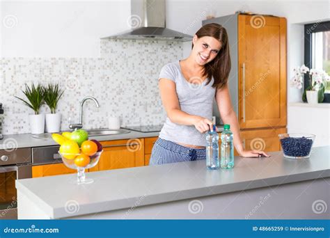 Still Water Vs Sparkling Water Stock Image - Image of healthy, female ...