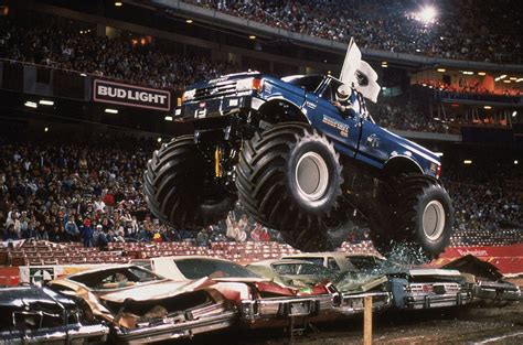 Bigfoot flies over cars during the monster truck rally at Anaheim ...