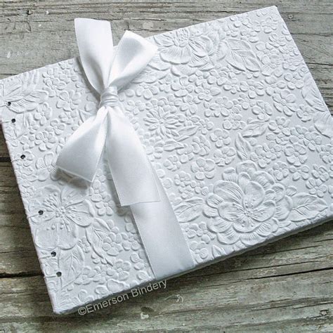 wedding guest book...the white embossing is gorgeous! | White wedding ...