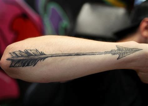 Arrow Tattoos for Men | Mens arrow tattoo, Feather tattoos, Arrow tattoos