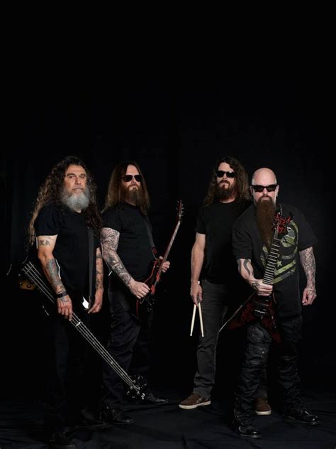 Download Slayer Band Members With Instruments Wallpaper | Wallpapers.com