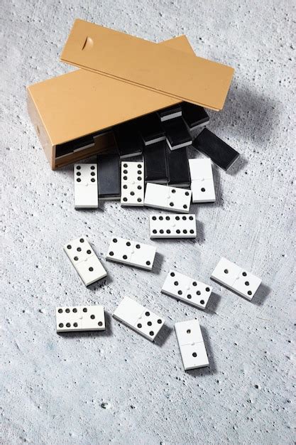 Premium Photo | Dominoes game classic entertainment Concept of strategy ...