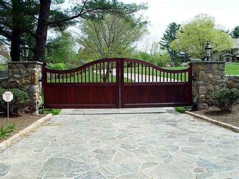 Gorgeous mahogany wood automated driveway gate. Picket post top, solid ...