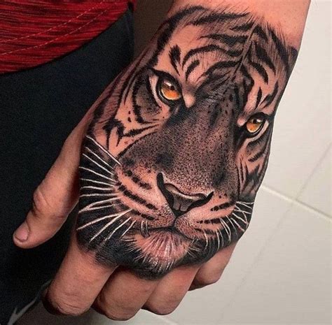 Tiger hand tattoo | www.otziapp.com | Tiger hand tattoo, Hand tattoos ...