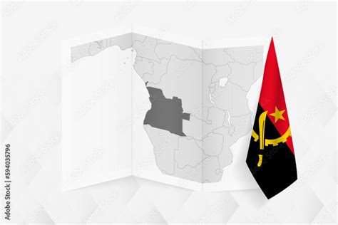 A grayscale map of Angola with a hanging Angolan flag on one side ...