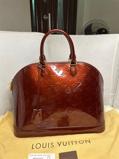 Louis Vuitton Alma MM, Luxury, Bags & Wallets on Carousell