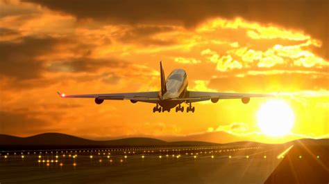 Passenger airplane landing against sunset caught by camera Stock Video ...