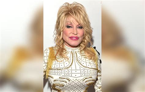 Dolly Parton's Plastic Face Fiasco Revealed In Shocking New Photos