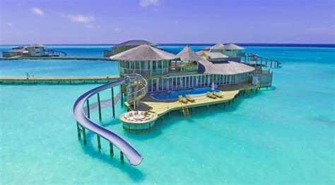 These villas in the Maldives have slides to take you right into the ...