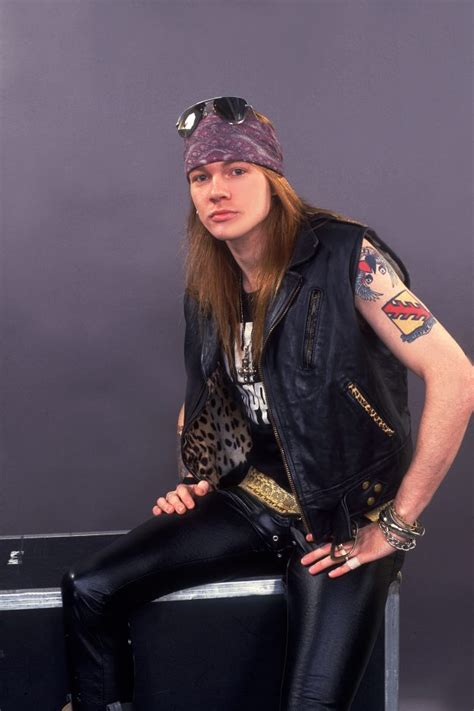 Guns N Roses frontman Axl Rose looks unrecognisable as he signs ...